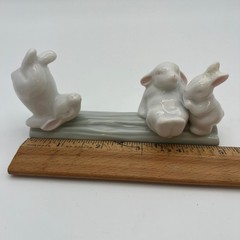 Unbranded Porcelain Three Bunnies on Log Figurine Small White Green Glossy Decor