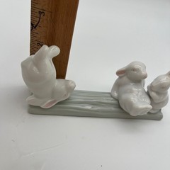 Unbranded Porcelain Three Bunnies on Log Figurine Small White Green Glossy Decor