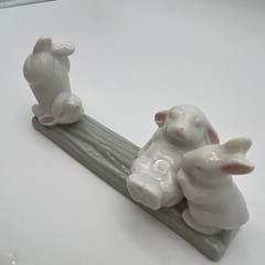 Unbranded Porcelain Three Bunnies on Log Figurine Small White Green Glossy Decor