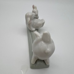 Unbranded Porcelain Three Bunnies on Log Figurine Small White Green Glossy Decor