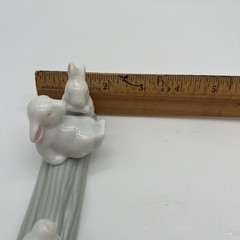 Unbranded Porcelain Three Bunnies on Log Figurine Small White Green Glossy Decor